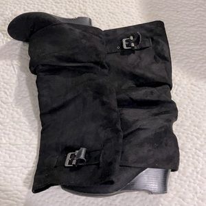 Black dress boots with small heel.